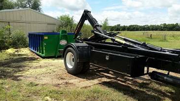 Delivery of 25 yard roll off dumpster by Heartland Recycling Services